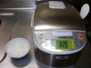 A bowl of rice with typical rice cooker