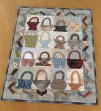 バスケットをピースワークしたミニキルト